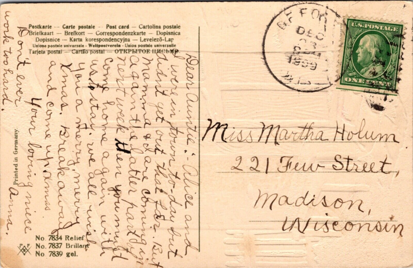 Christmas Postcard Looking Into a Snow Covered House at Candlelit Tree