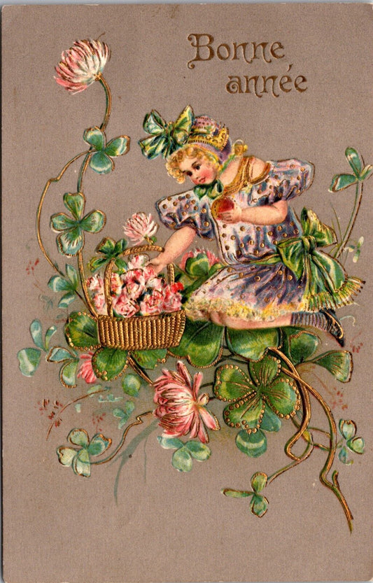 1906 New Year Postcard Blonde Girl Sits on 4 Leaf Clovers, Blossoms in Basket